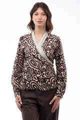 Blusa in voile stampato con incrocio laterale